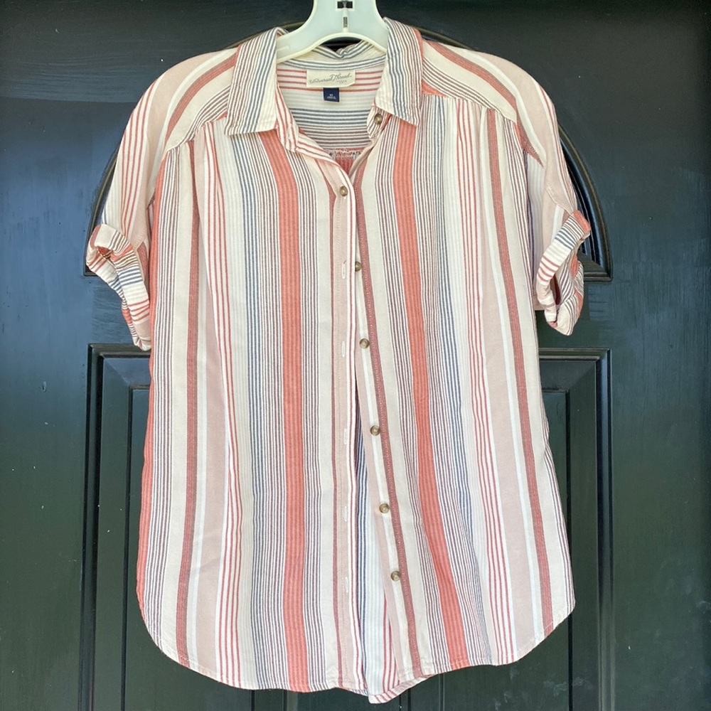 Womens striped button down top with cuffed short sleeves.